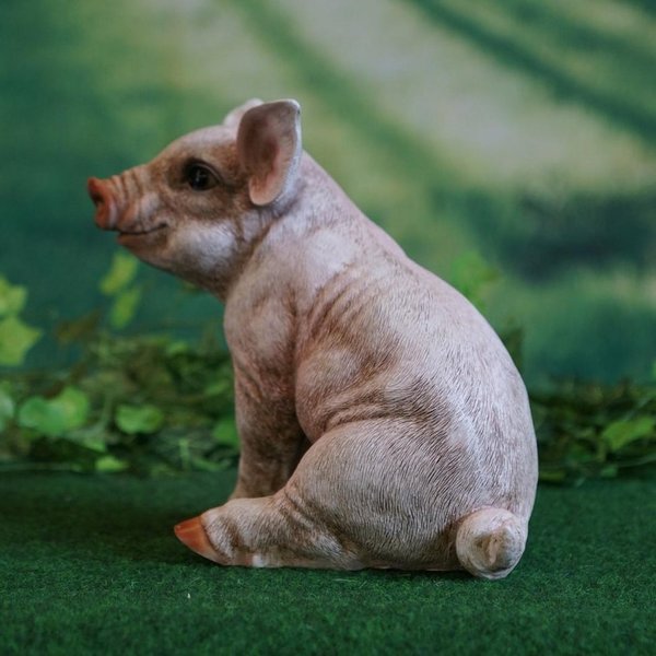 Tierfigur Schwein 30 cm hoch sitzend handbemalt