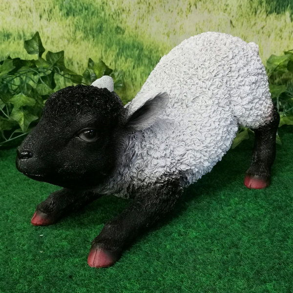 Tierfigur Lamm spielend schwarz/weiß